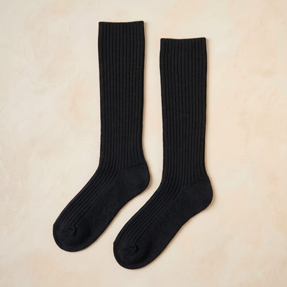Black women's 100% cashmere knee-high socks - pair shown flat