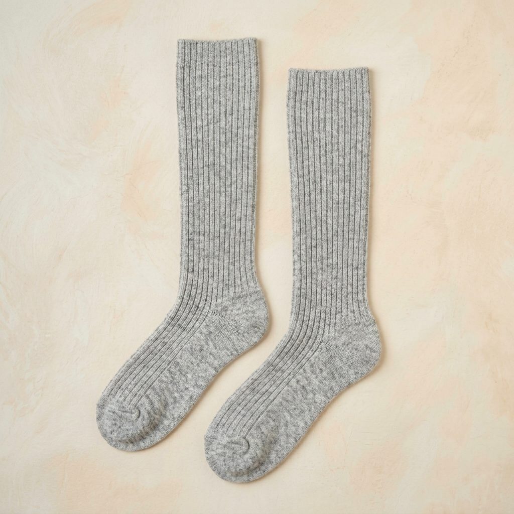 Light Grey Melange women's undyed cashmere knee-high socks - pair shown flat