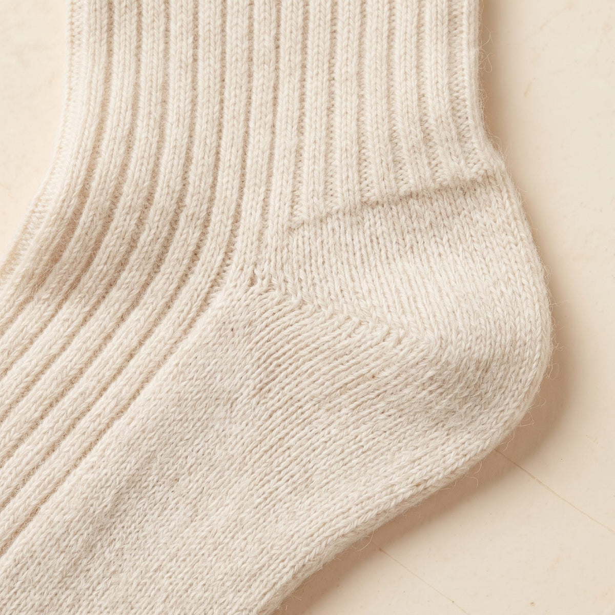 Off-White women's 100% cashmere knee-high socks - knit texture close-up