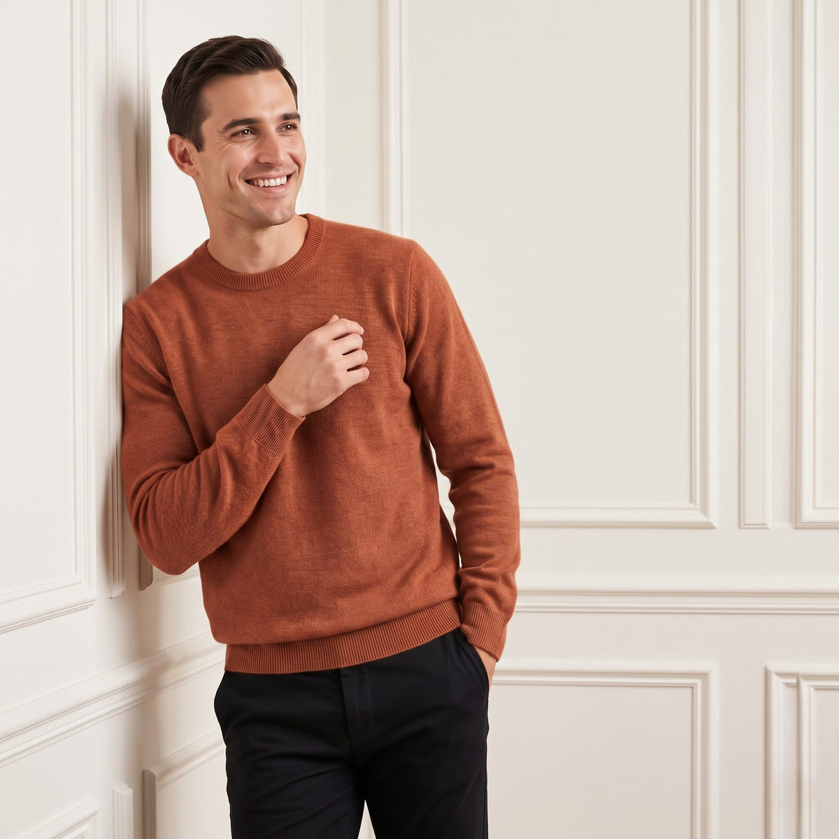 Amber men's 100% cashmere crewneck sweater - front view, hand at chest