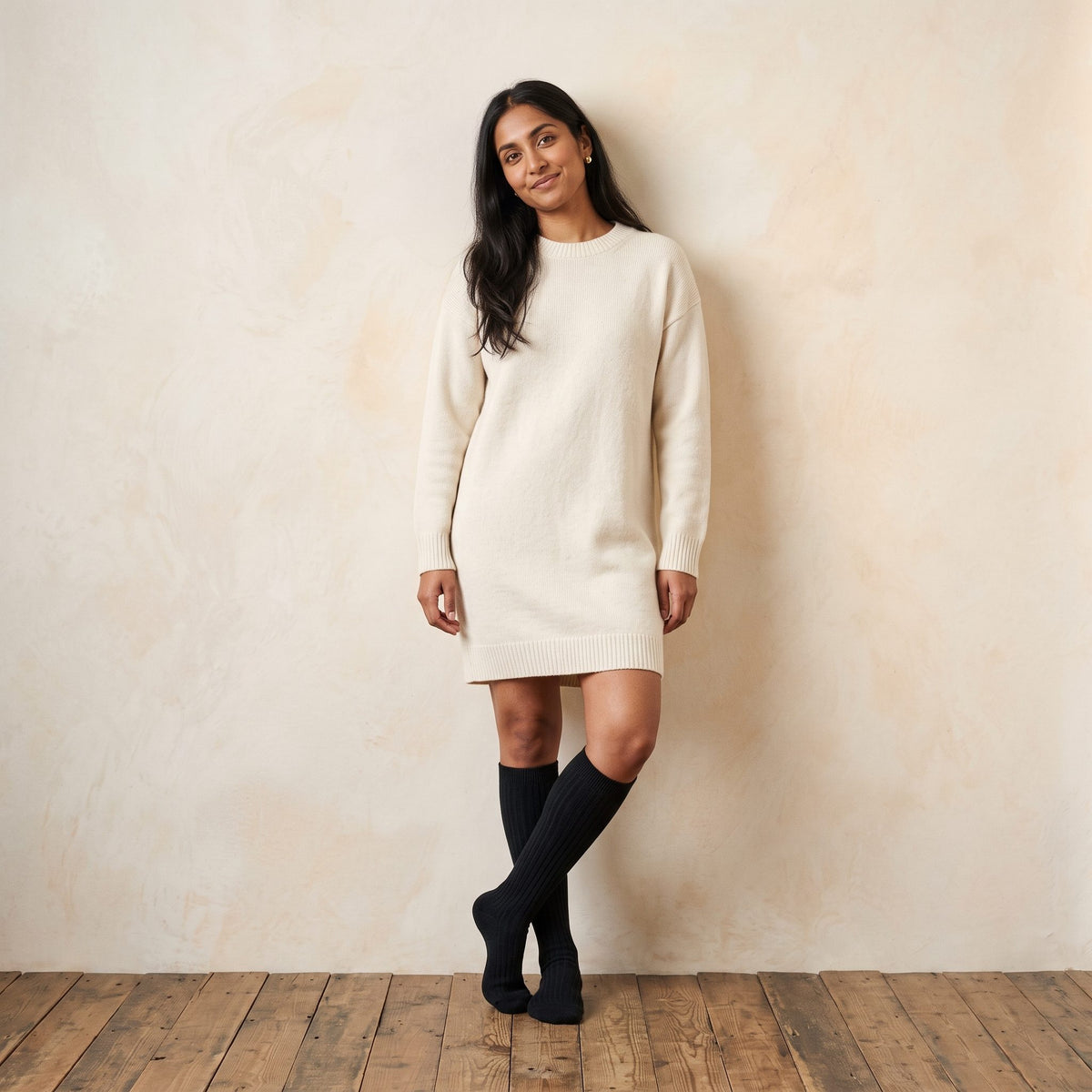Black women's 100% cashmere knee-high socks - worn by a model, view 1
