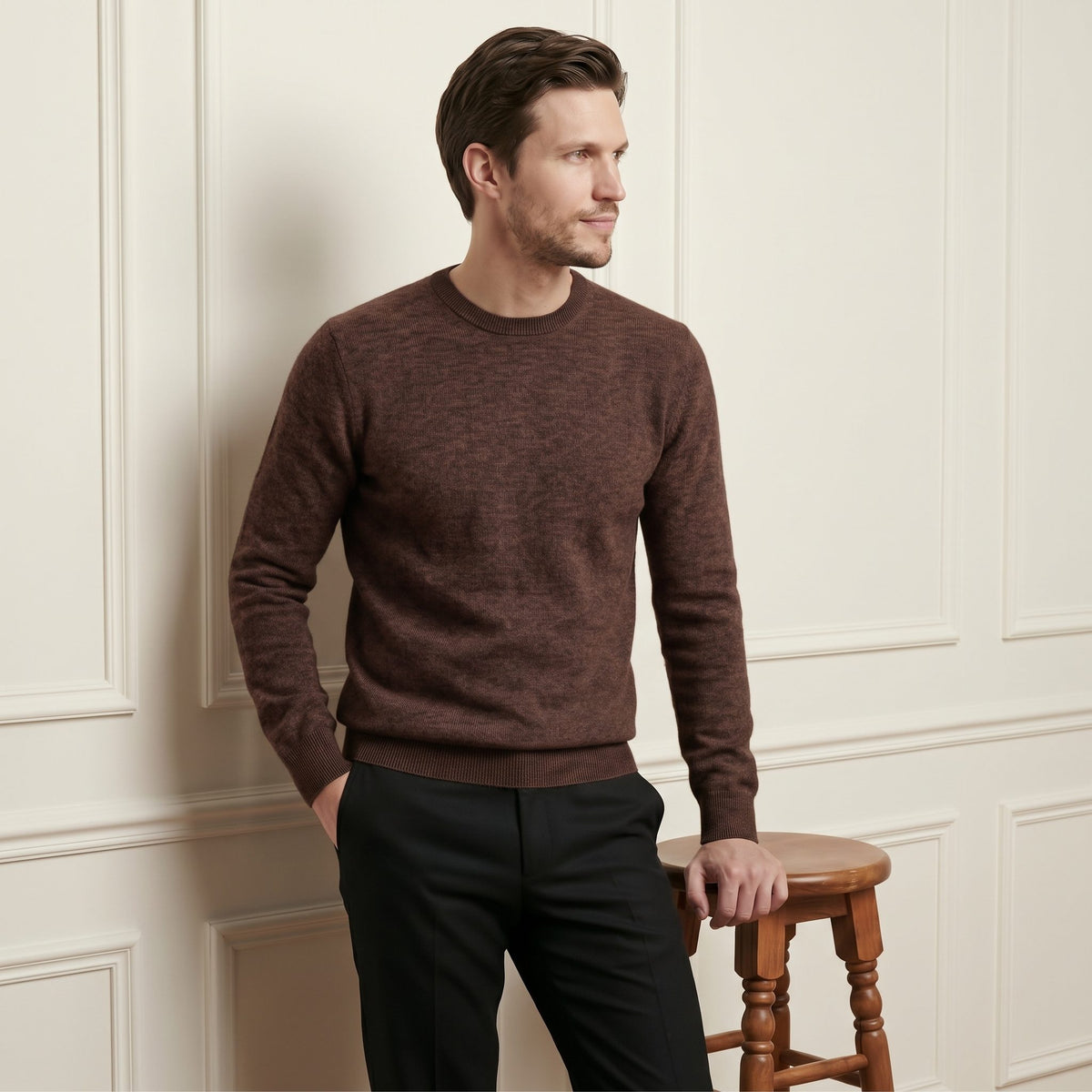 Brown men's 100% cashmere crewneck sweater - front view, standing beside stool