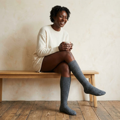 Dark Grey Melange women's undyed cashmere knee-high socks - worn by a model, view 1