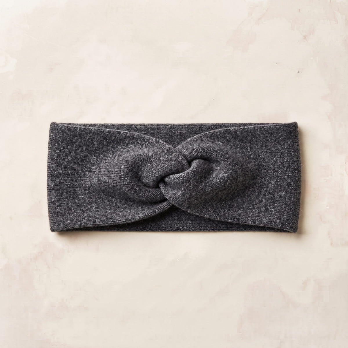 Undyed Gomba twisted-front cashmere headband in Dark Grey Melange, flat front