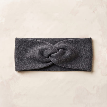Undyed Gomba twisted-front cashmere headband in Dark Grey Melange, flat front
