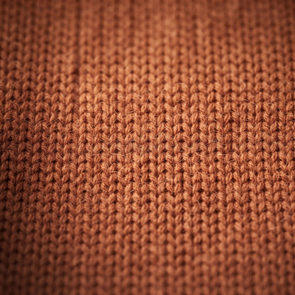 Gomba twisted-front cashmere headband in Amber, knit texture