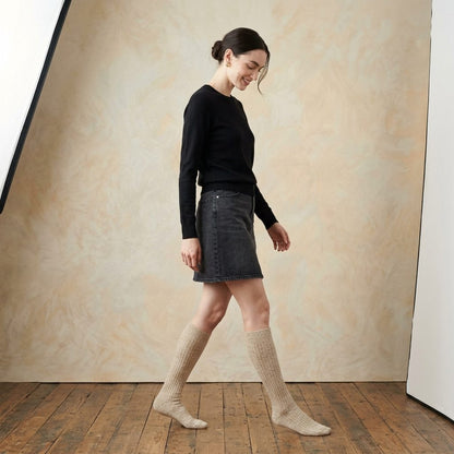Oatmeal Melange women's undyed cashmere knee-high socks - worn by a model, view 3