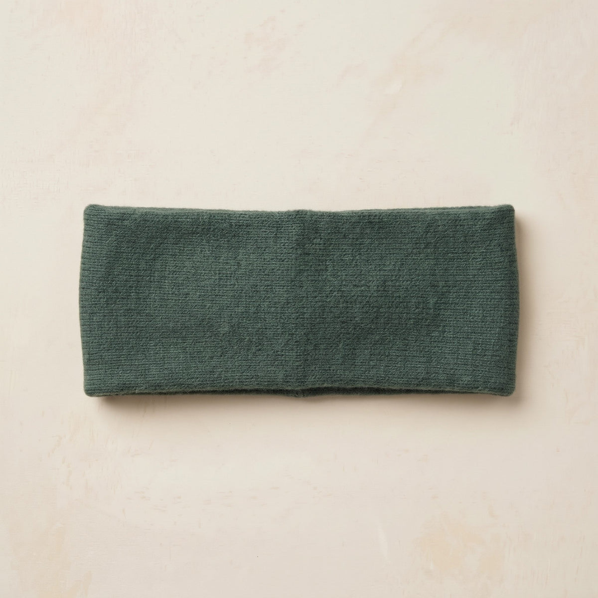 Gomba twisted-front cashmere headband in Pine, flat back