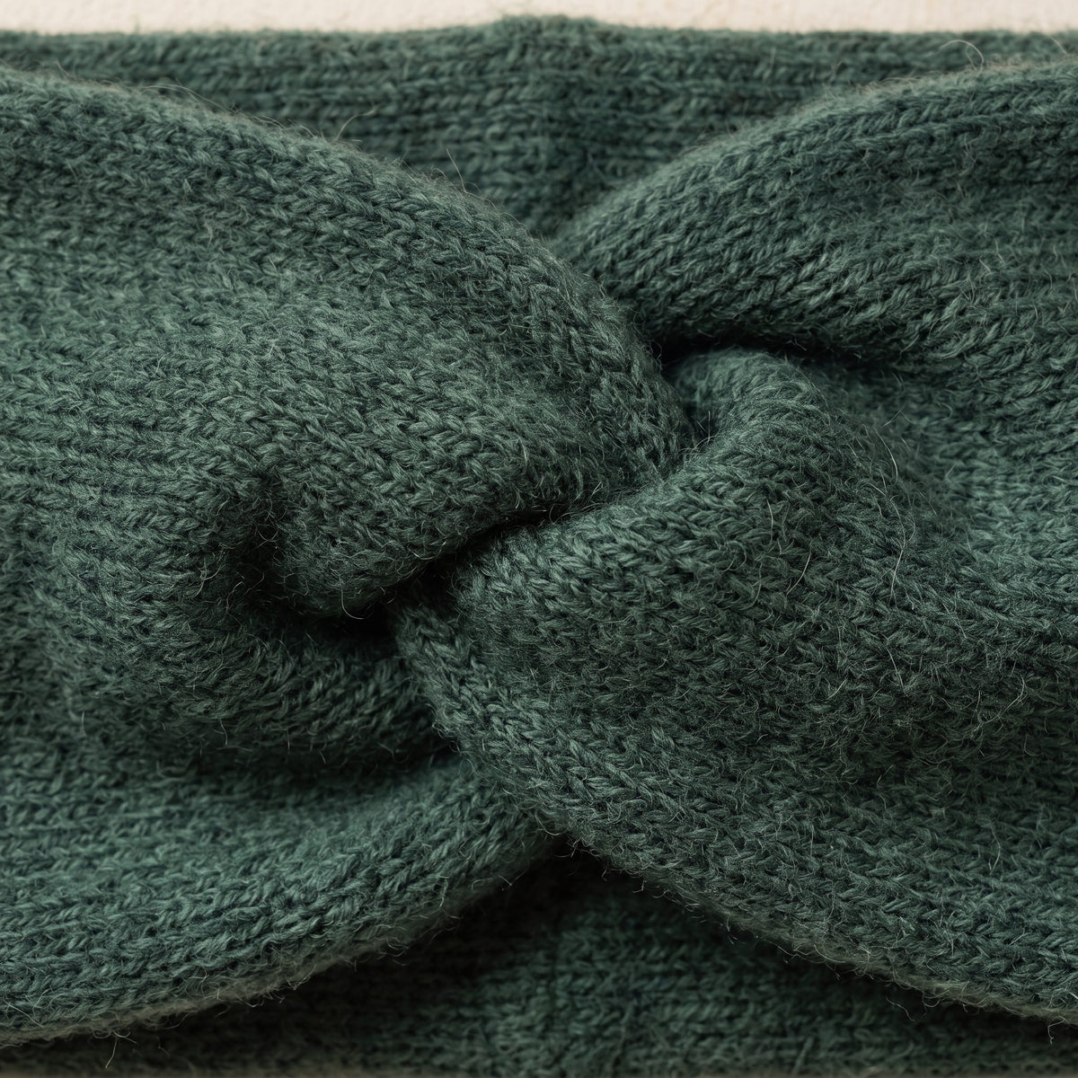 Gomba twisted-front cashmere headband in Pine, twist detail