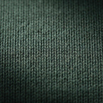 Gomba twisted-front cashmere headband in Pine, knit texture