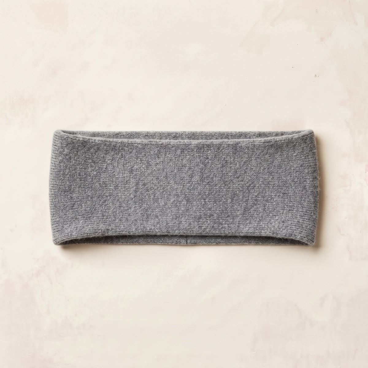 Undyed Gomba twisted-front cashmere headband in Mid Grey Melange, flat back