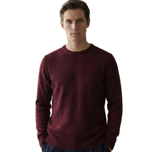 Man wearing a maroon sweater on a white background