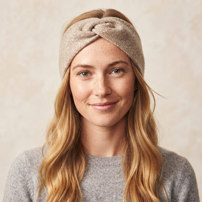 Undyed Gomba twisted-front cashmere headband in Oatmeal Melange, worn front
