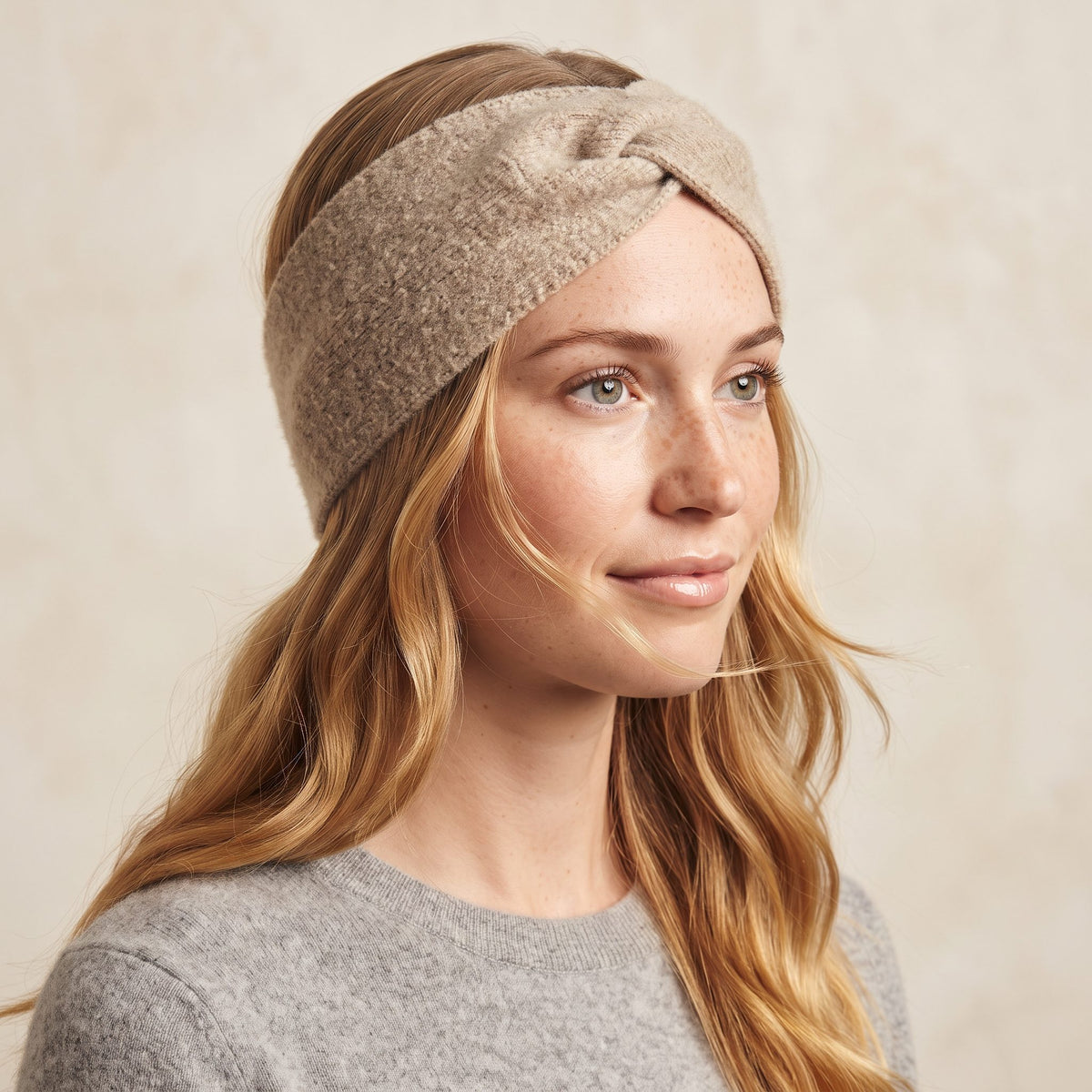 Undyed Gomba twisted-front cashmere headband in Oatmeal Melange, worn side