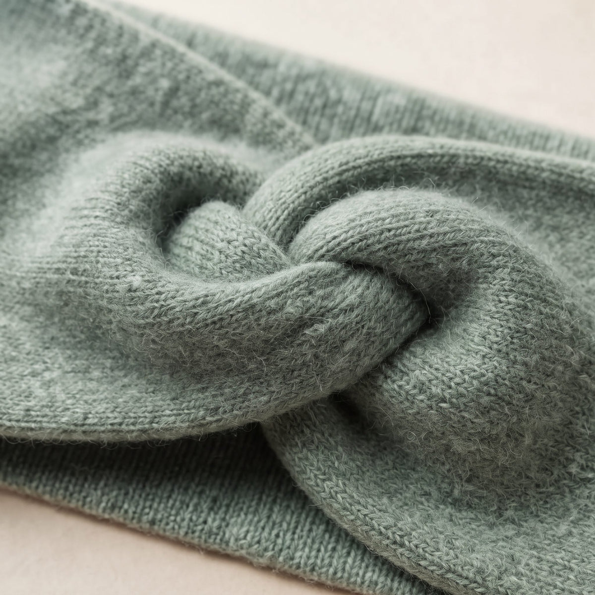 Gomba twisted-front cashmere headband in Heathered Jade, twist detail