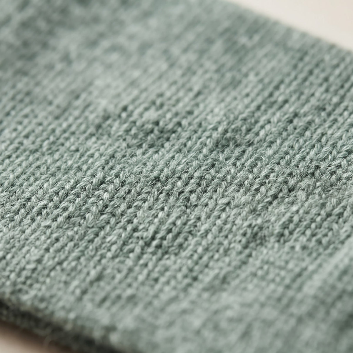 Gomba twisted-front cashmere headband in Heathered Jade, knit texture
