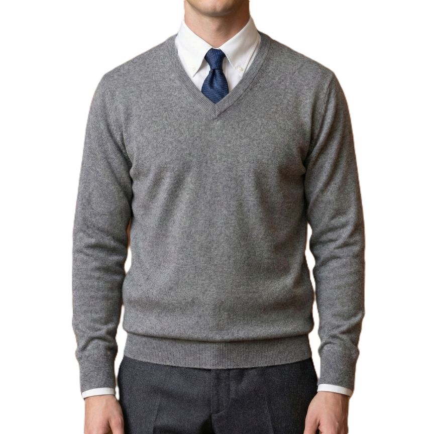 Gray sweater over a white shirt with a blue tie on a white background
