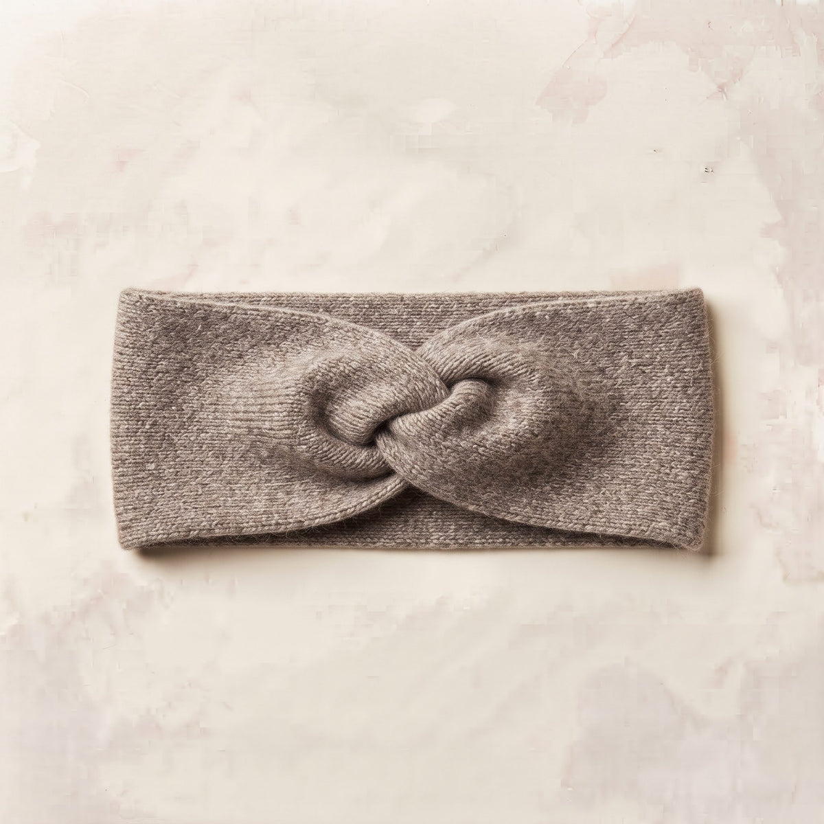 Undyed Gomba twisted-front cashmere headband in Toast Melange, flat front