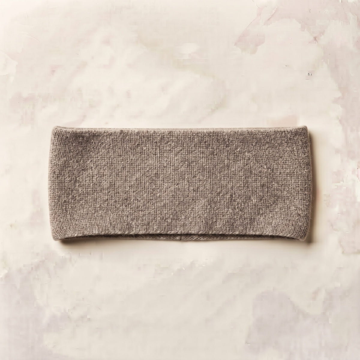 Undyed Gomba twisted-front cashmere headband in Toast Melange, flat back