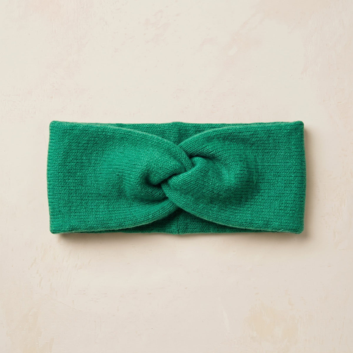Gomba twisted-front cashmere headband in Kelly Green, flat front