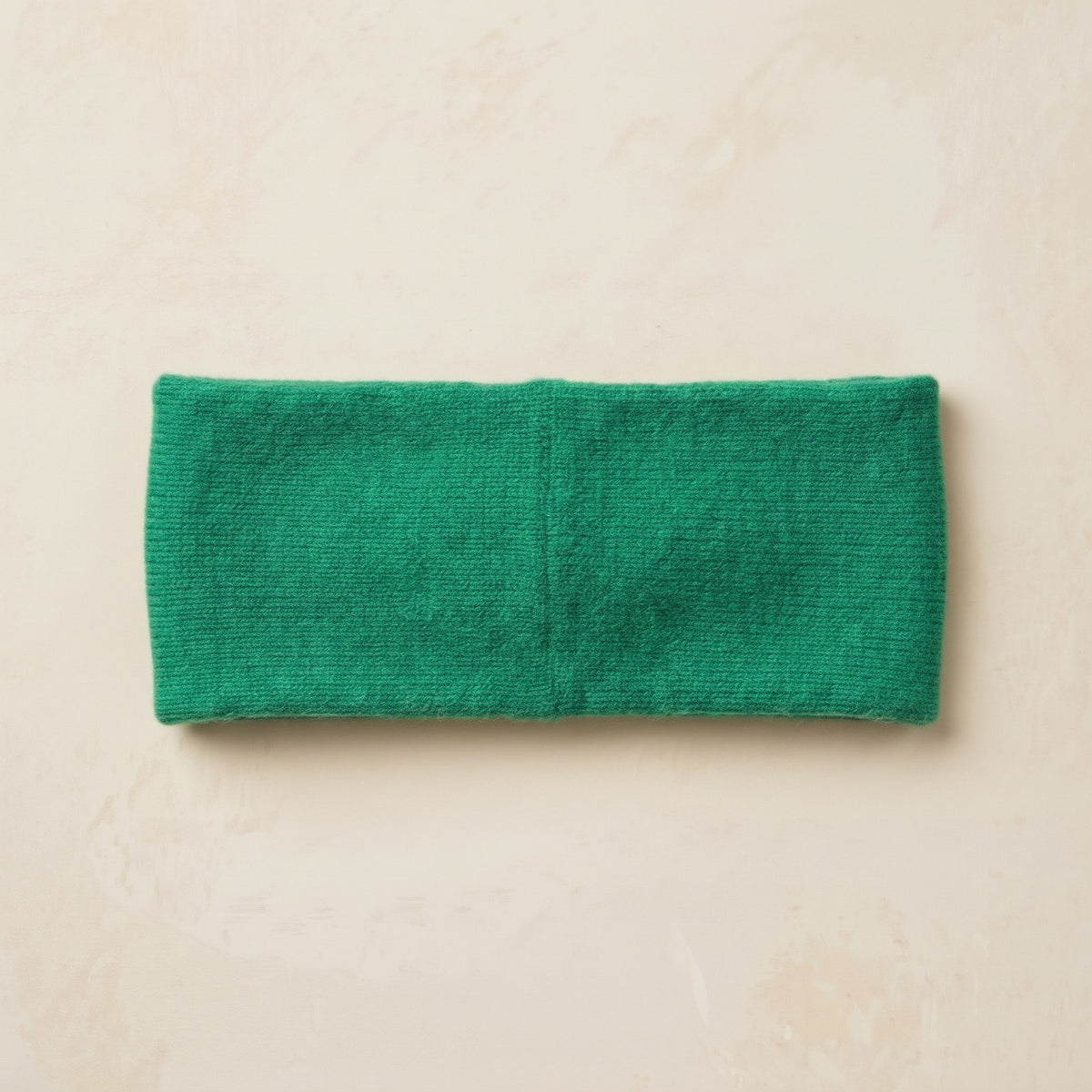 Gomba twisted-front cashmere headband in Kelly Green, flat back