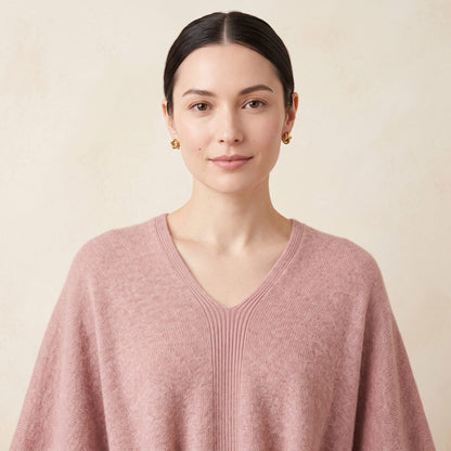Women's V-neck cashmere poncho in Blush Pink — worn by a model