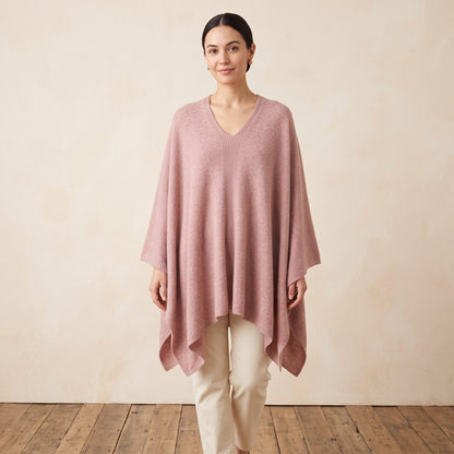 Women's V-neck cashmere poncho in Blush Pink — worn by a model (2)