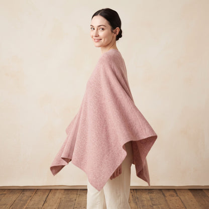Women's V-neck cashmere poncho in Blush Pink — worn by a model (3)