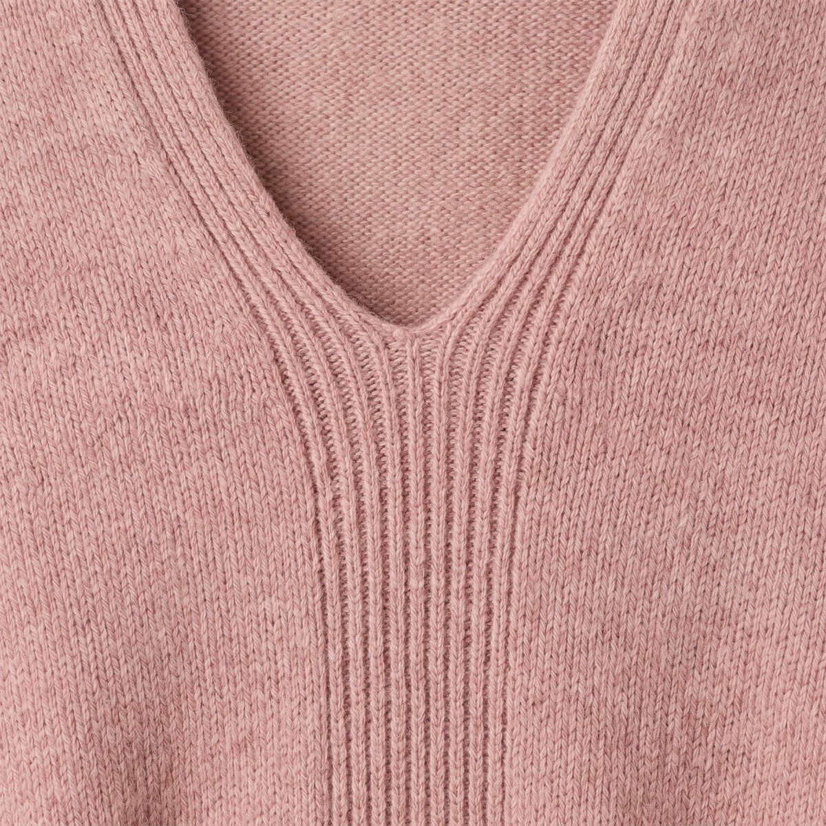 Women's V-neck cashmere poncho in Blush Pink — V-neckline detail