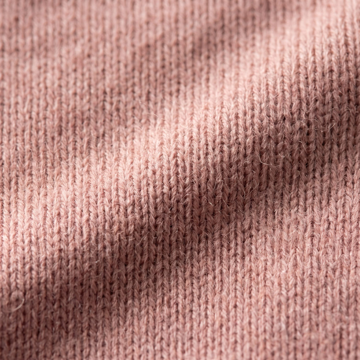 Women's V-neck cashmere poncho in Blush Pink — knit texture detail