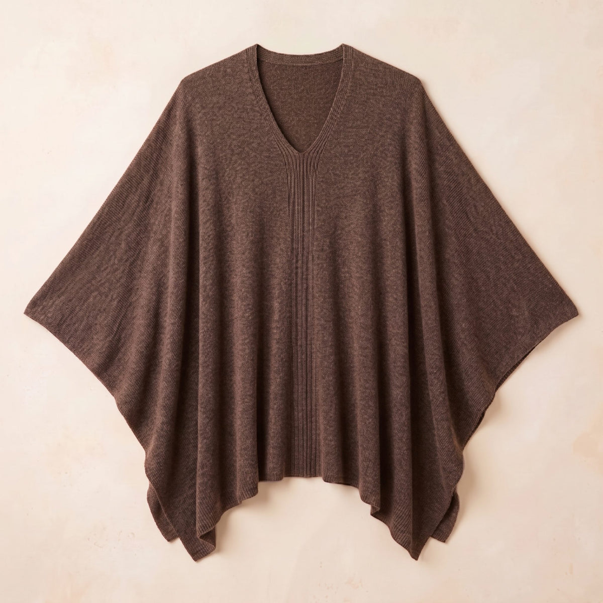 Women's V-neck cashmere poncho in Brown — laid flat