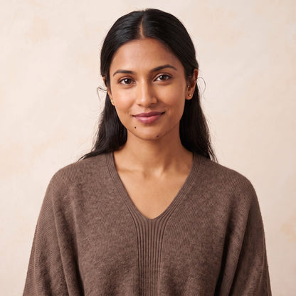 Women's V-neck cashmere poncho in Brown — worn by a model