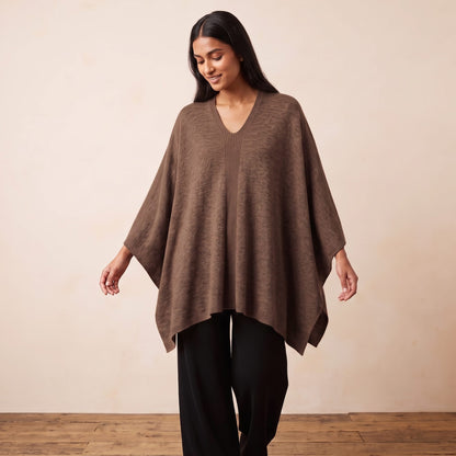 Women's V-neck cashmere poncho in Brown — worn by a model (2)