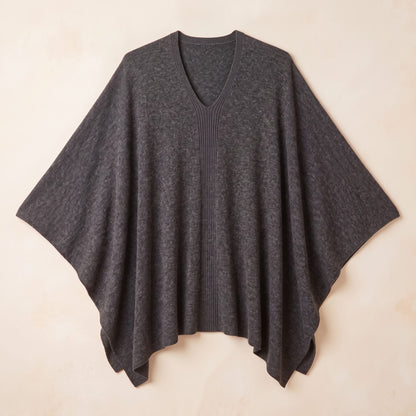 Women's undyed cashmere poncho in Dark Grey Melange — laid flat