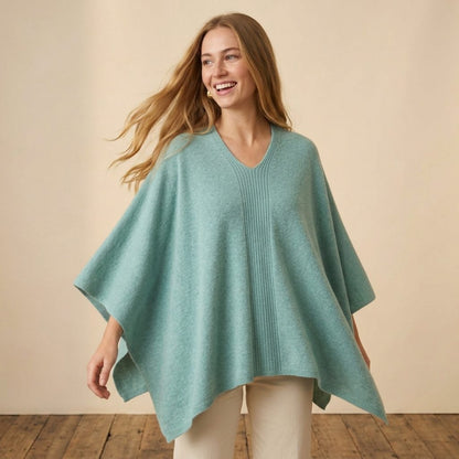Women's V-neck cashmere poncho in Heathered Jade — worn by a model (3)
