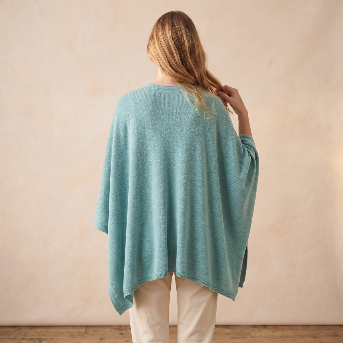 Women's V-neck cashmere poncho in Heathered Jade — worn by a model (4)