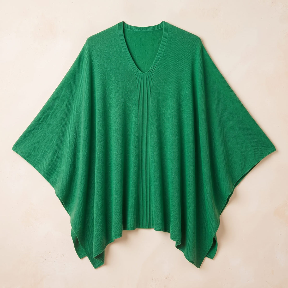 Women's V-neck cashmere poncho in Kelly Green — laid flat