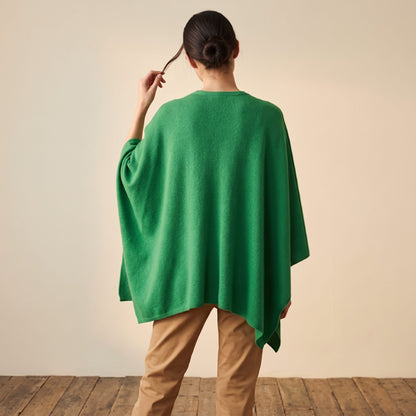 Women's V-neck cashmere poncho in Kelly Green — worn by a model (4)
