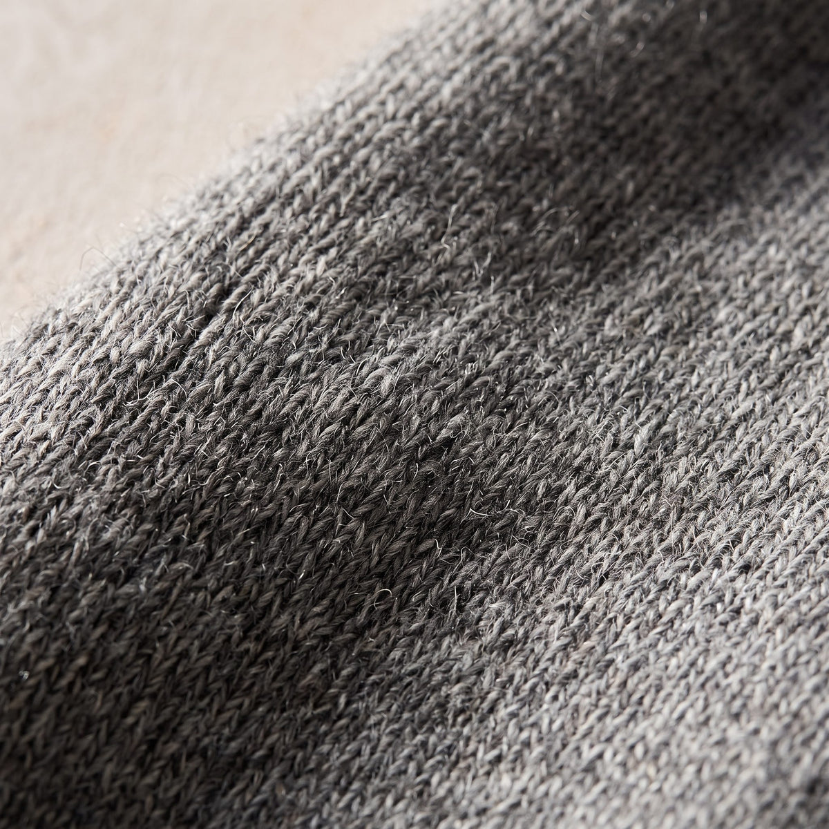 Women's undyed cashmere poncho in Light Grey Melange — worn by a model