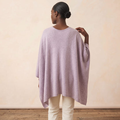 Women's V-neck cashmere poncho in Lilac — worn by a model (4)