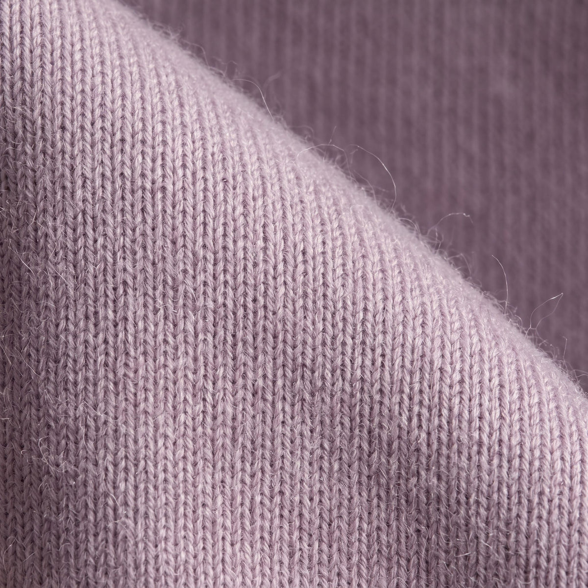 Women's V-neck cashmere poncho in Lilac — knit texture detail