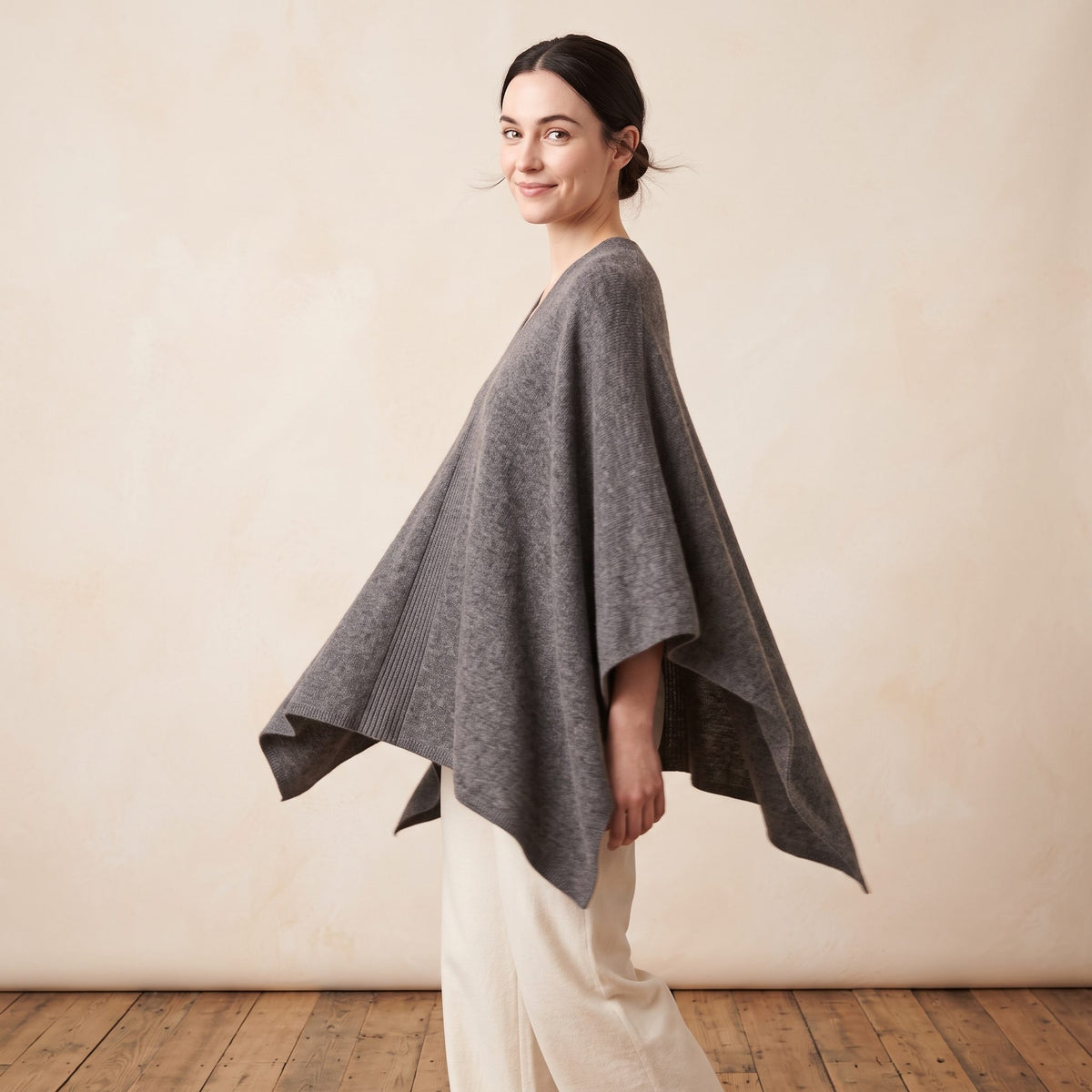 Women's undyed cashmere poncho in Mid Grey Melange — worn by a model (3)