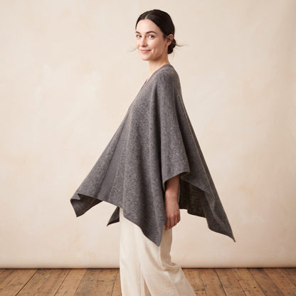 Women's undyed cashmere poncho in Mid Grey Melange — worn by a model (3)