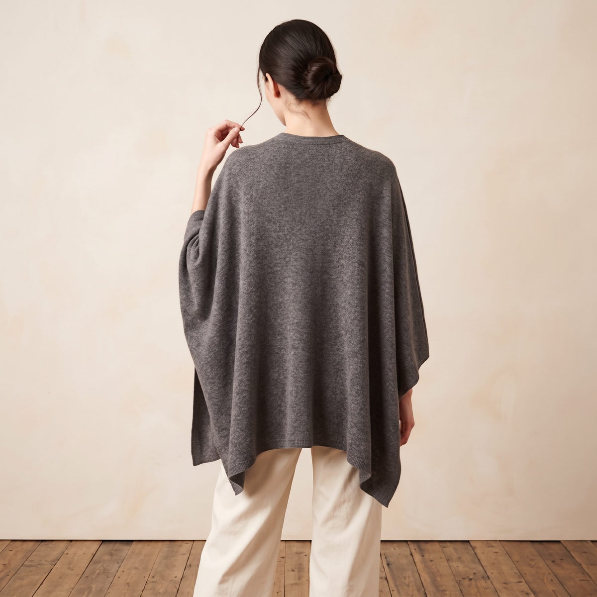 Women's undyed cashmere poncho in Mid Grey Melange — worn by a model (4)
