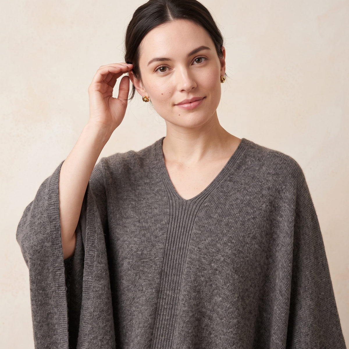 Women's undyed cashmere poncho in Mid Grey Melange — worn by a model (5)