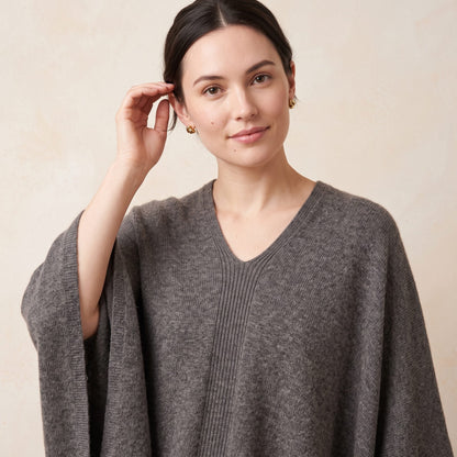 Women's undyed cashmere poncho in Mid Grey Melange — worn by a model (5)