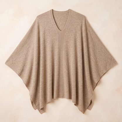 Women's undyed cashmere poncho in Oatmeal Melange — laid flat