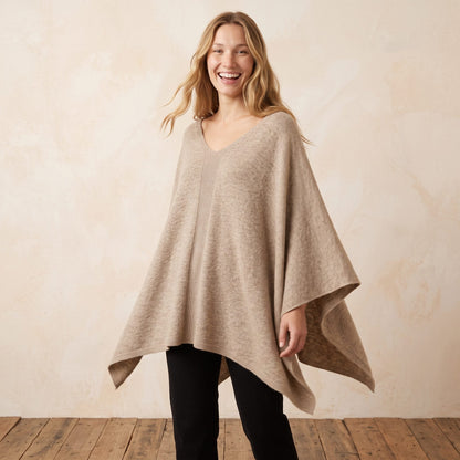 Women's undyed cashmere poncho in Oatmeal Melange — worn by a model (3)