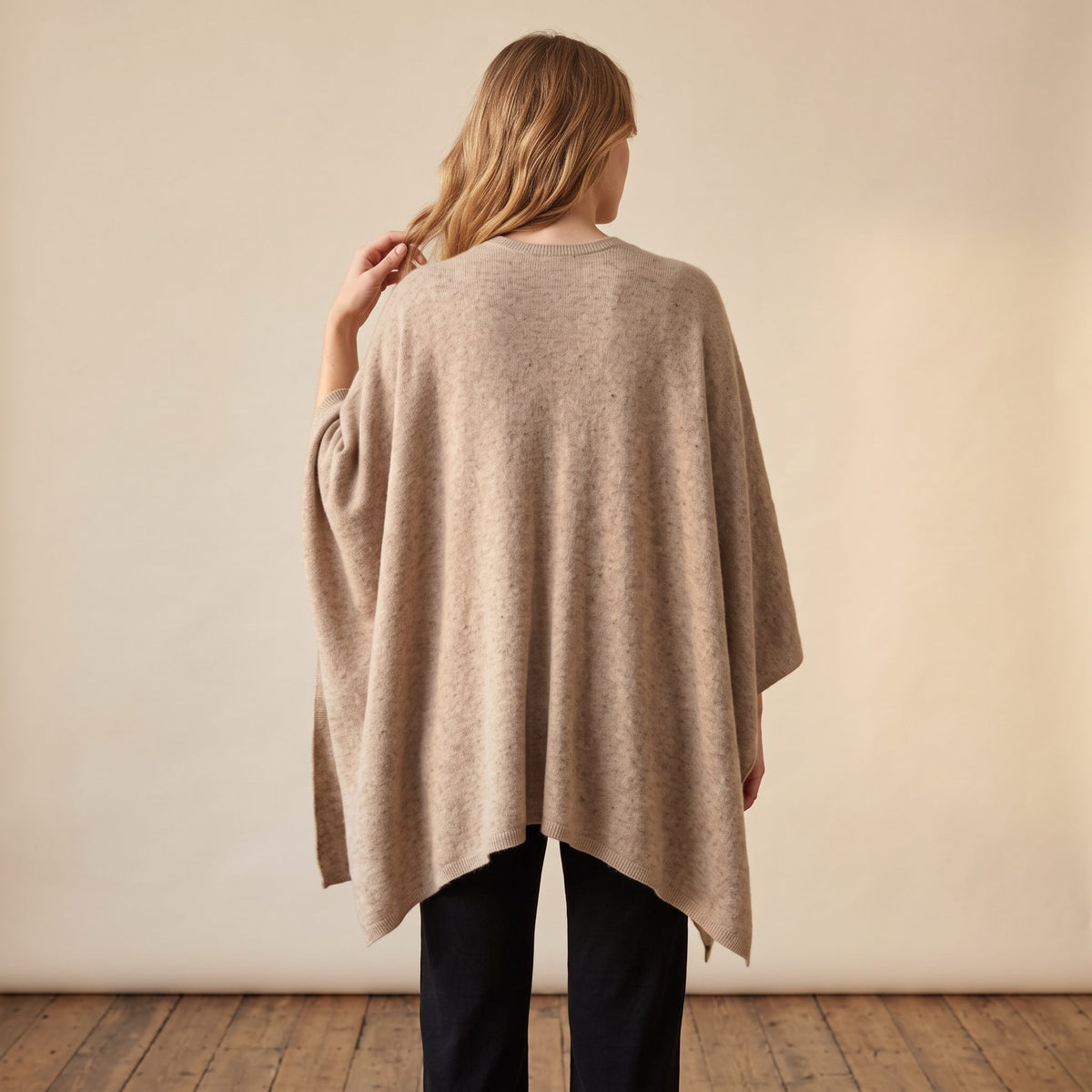 Women's undyed cashmere poncho in Oatmeal Melange — worn by a model (4)