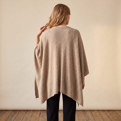 Women's undyed cashmere poncho in Oatmeal Melange — worn by a model (4)